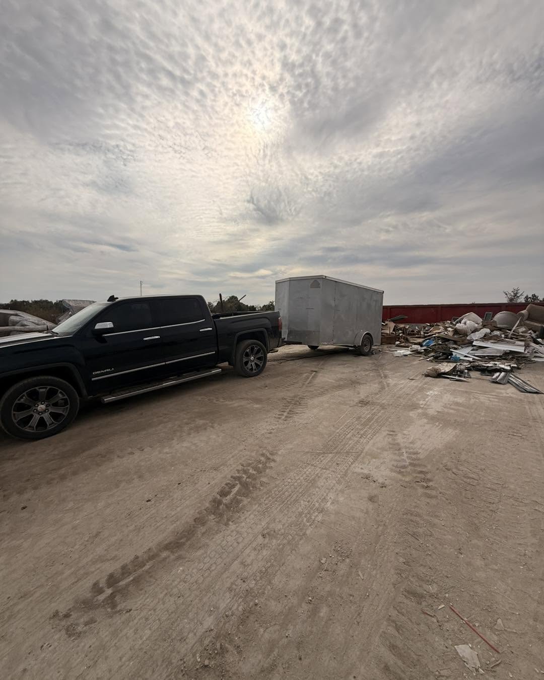 WideWash pickup truck and trailer at a disposal site